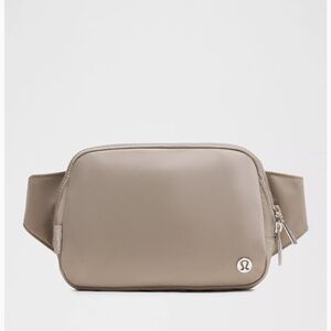 lululemon athletica Unisex Tan Crossbody Bag.
